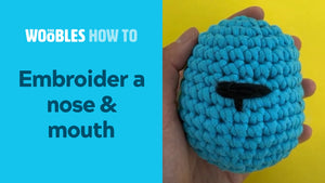 Embroider a nose & mouth