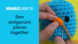 Sew amigurumi parts together